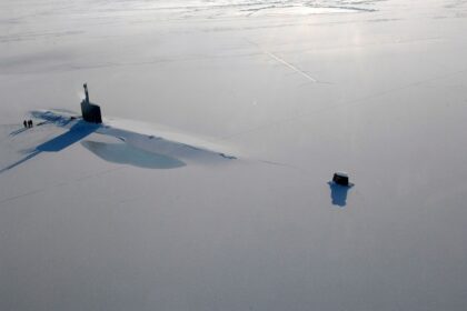 broken Arctic sea ice floating on cold ocean water