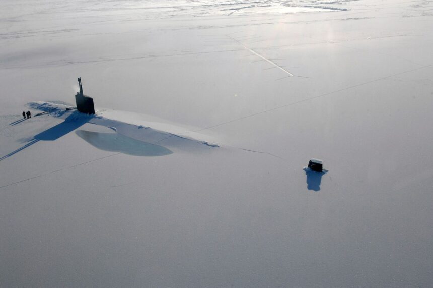broken Arctic sea ice floating on cold ocean water